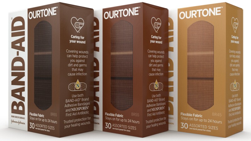 Boxes of BAND-AID OURTONE Brand Adhesive Bandages
